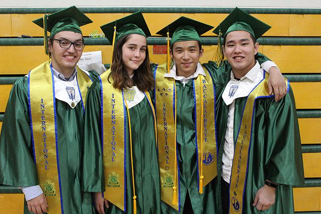  CDO Valedictorian Joe Liang, second from the right, poses with fellow IB students.