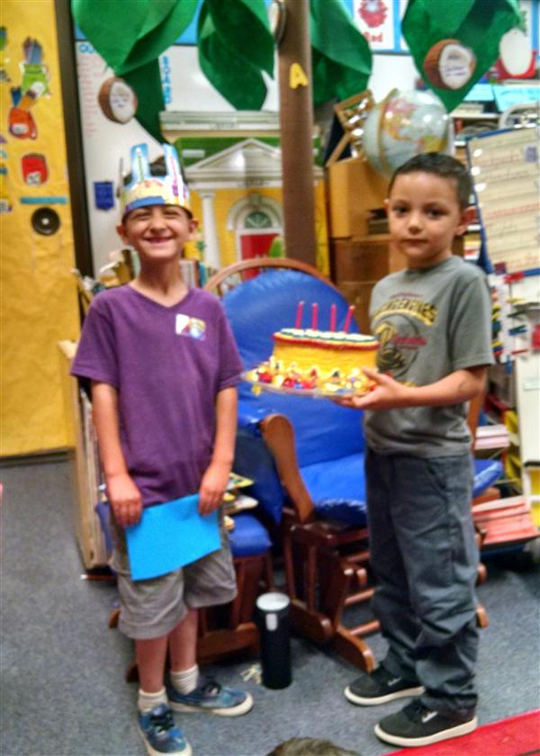 Raul turned 6!  His friend, Isaiah, helped him bake a cake! 